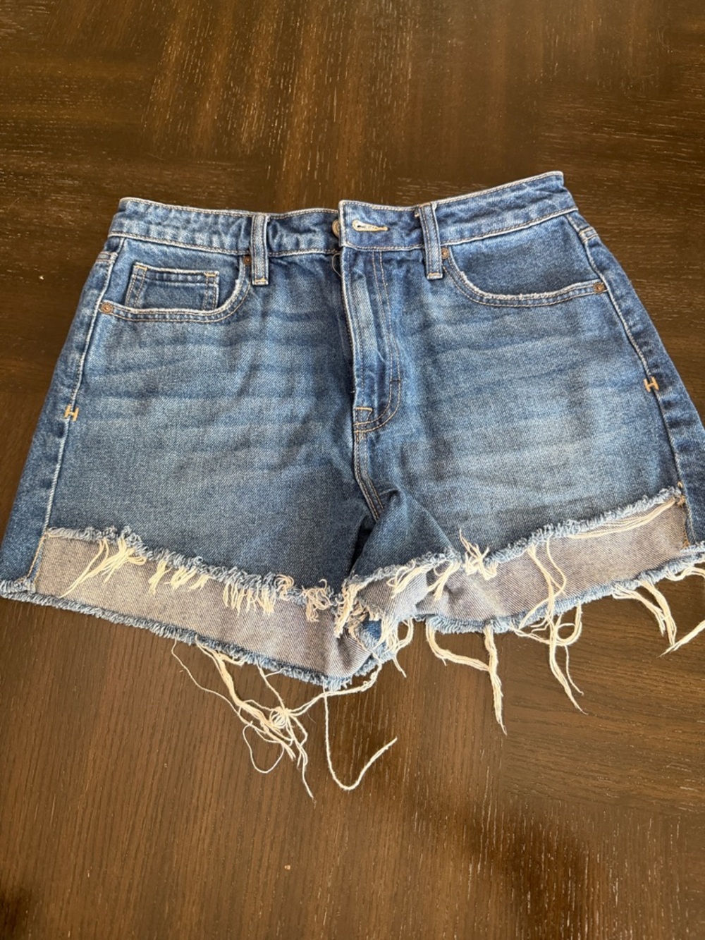 High-Rise Distressed Jean Shorts in Medium Blue